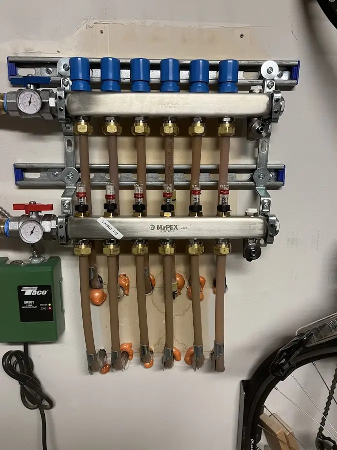 Plumber performing Water Heater Repair at a residential property in Duryea